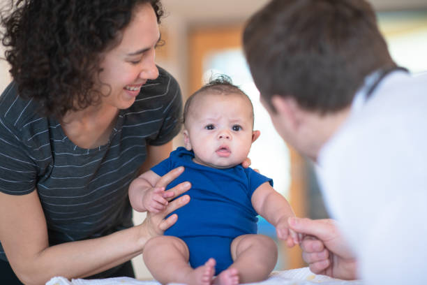 istock Mother holding her toddler 1153306835