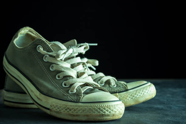 istock Dirty sneaker in darkness. 1153308766