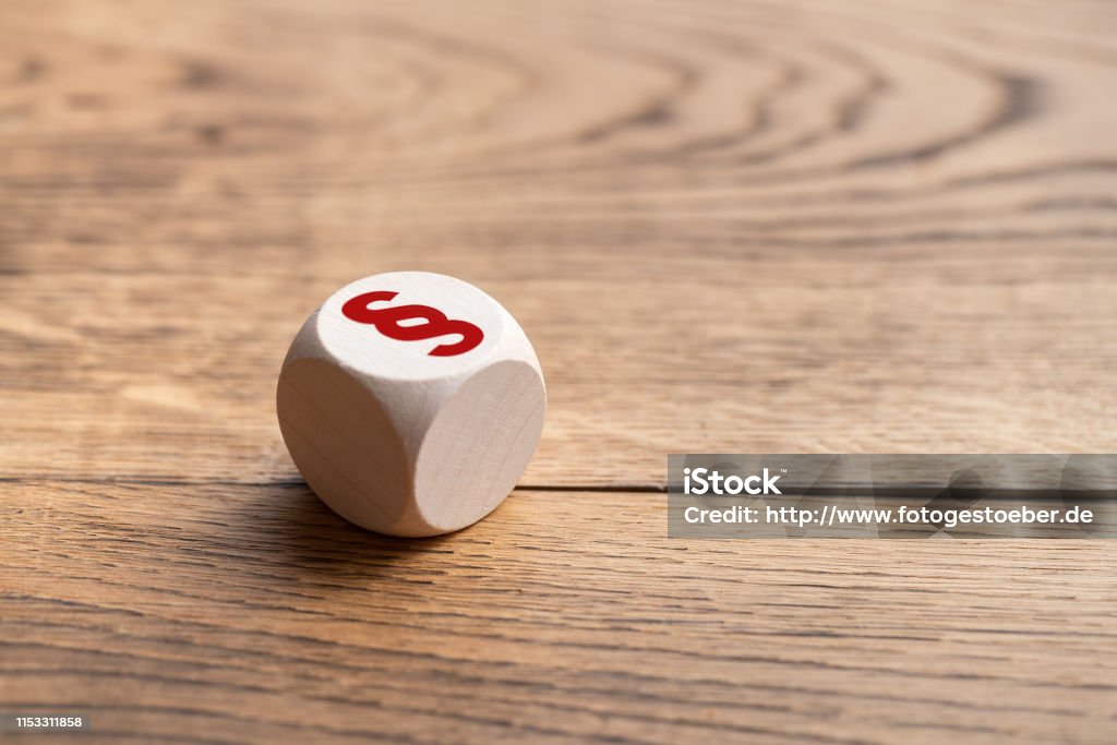 cube with a paragraph symbol cube with a paragraph symbol  on wooden background Paragraph Stock Photo
