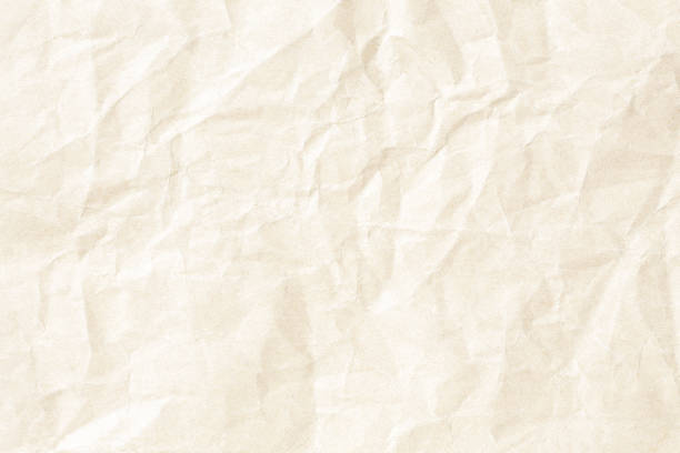 istock Old brown crumpled paper background texture 1153317251