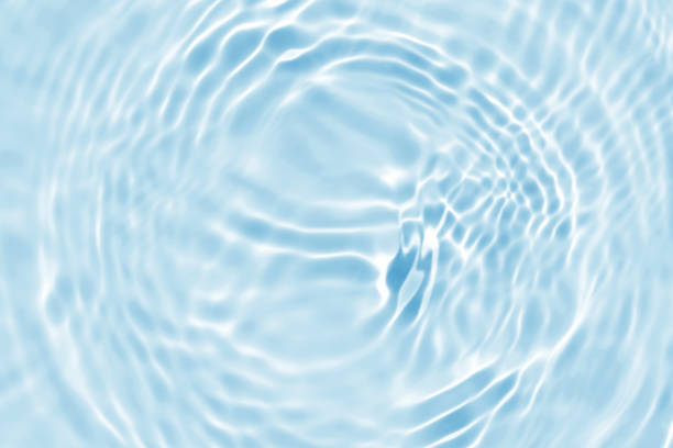 ナチュラルブルーウェーブ抽象またはリップル水テクスチャの背景 - 水 ストックフォトと画像