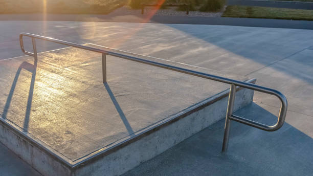 istock Panorama frame Concrete square platform at a park viewed on a sunny day 1153329101