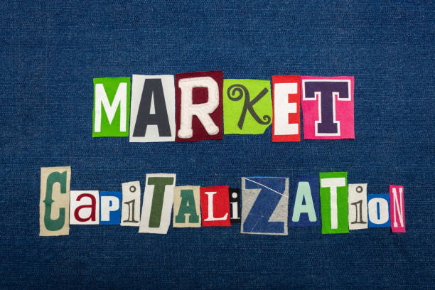 istock MARKET CAPITALIZATION text word collage, multi colored fabric on blue denim, market value concept 1153333855