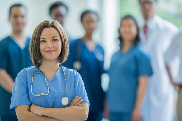 Medical doctor or nurse Team of medical professionals in a research and training facility. civilian stock pictures, royalty-free photos & images