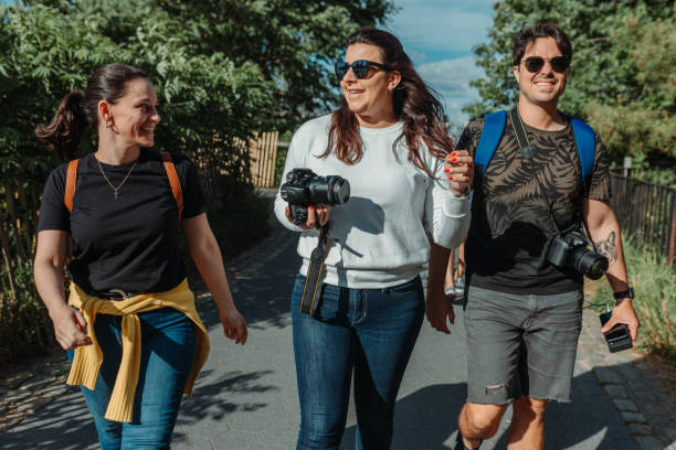 istock Friends walking in the park 1153336245