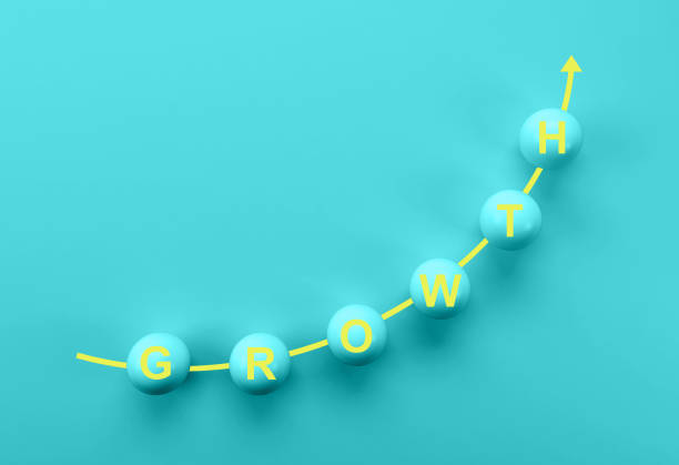 istock Business growth, progress or success concept. blue sphere with word GROWTH on blue background. 1153346358
