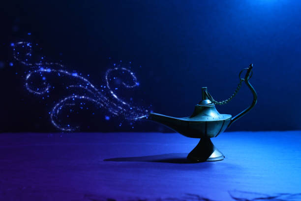 istock Image of magical mysterious aladdin lamp with glitter smoke. Dark background and dramatic light 1153349387