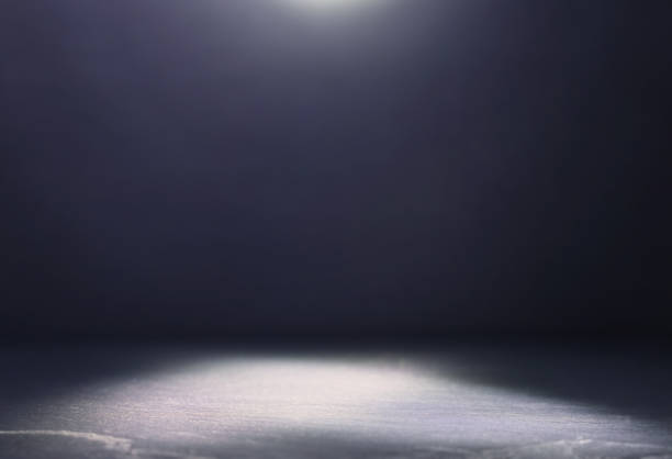 istock abstract dark concentrate floor scene with mist or fog, spotlight and display 1153349540
