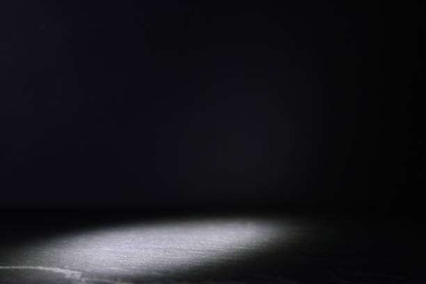 istock abstract dark concentrate floor scene with mist or fog, spotlight and display 1153349560