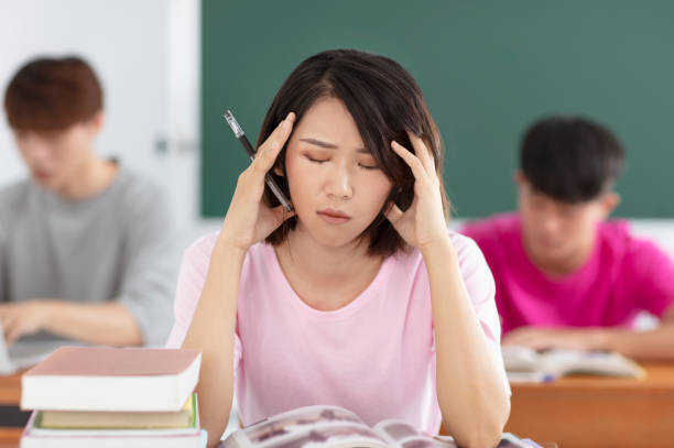 istock young female student feel stressed in classroom 1153349646