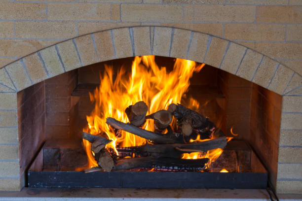 istock beautiful fire in the fireplace 1153351701