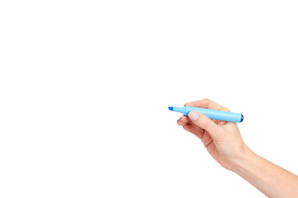 istock Hand with felt tip marker, drawing or writinng gesture. 1153357832