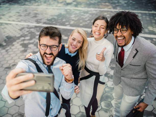 istock Business persons take a selfie in the city 1153358577
