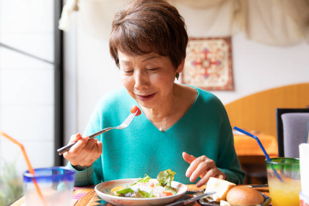 istock Eating healthy food 1153358772