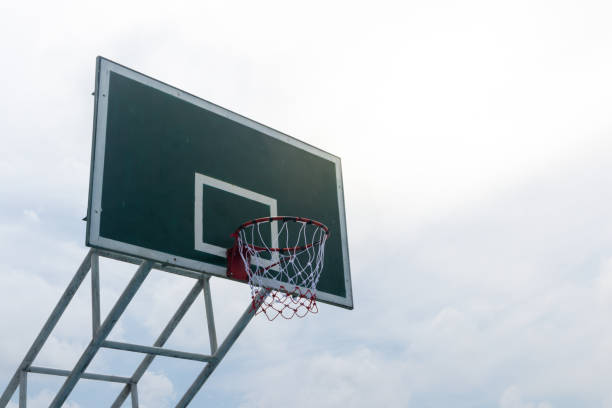 istock Low angle of the basketball pad with a metal loop and a white mesh 1153358793