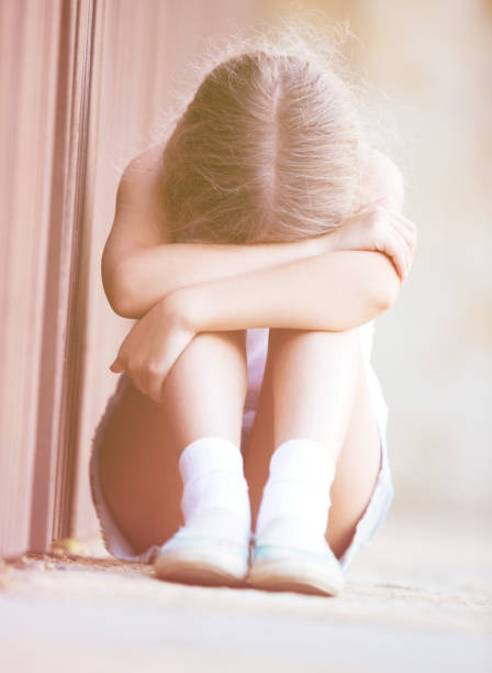 istock alone worried girl 1153359709