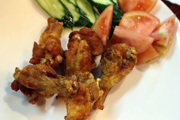 istock Japanese fried chicken served at traditional izakaya 1153360889