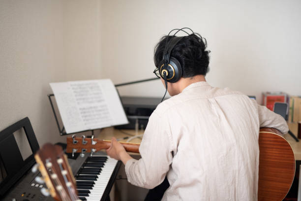 Singer-songwriter composing new song