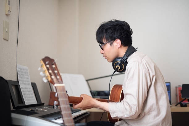 istock Singer-songwriter composing new song 1153364006