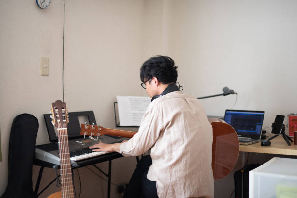 istock Singer-songwriter composing new song 1153364015