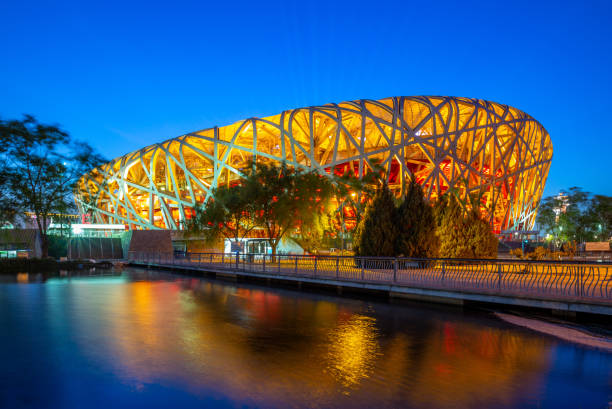 Beijing National Stadium at night Beijing National Stadium, also known as the Bird's Nest, was designed for use throughout the 2008 Summer Olympics. it was built in September 2007 and opened on 28 June 2008. birds nest photos stock pictures, royalty-free photos & images