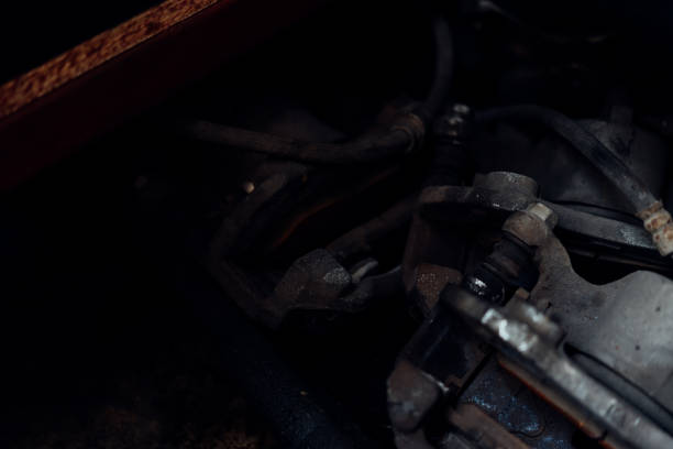 istock Disc brake and asbestos brake pads at car garage 1153369810