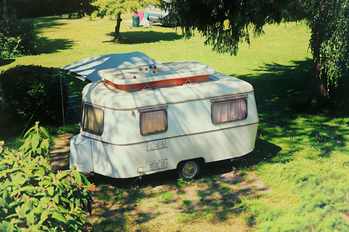 Historic 60s caravan in a campsite in Germany