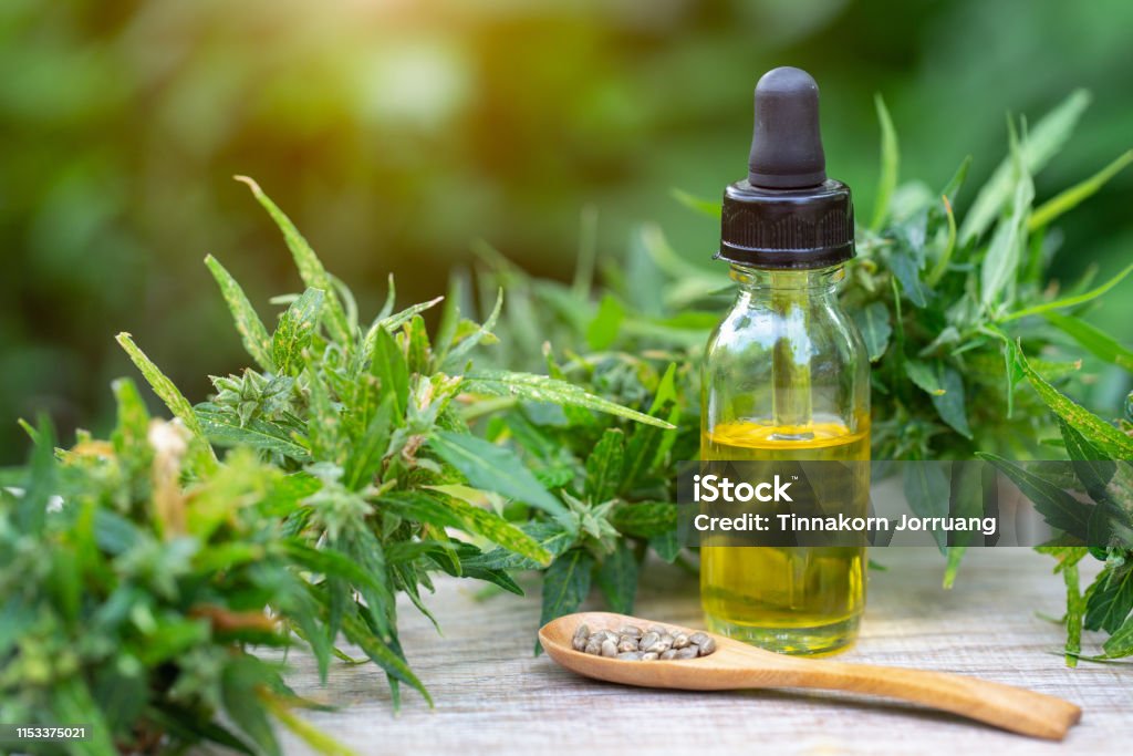 Hemp oil, Medical marijuana products including cannabis leaf,  cbd  and hash oil, alternative medicine Essential Oil Stock Photo