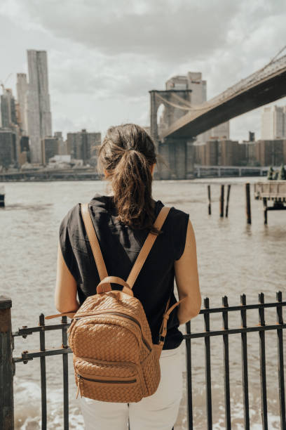 istock Woman visiting New York 1153376720
