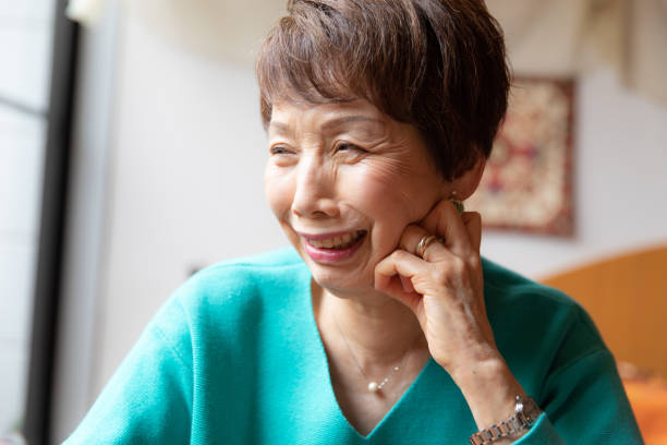 istock Beautiful senior woman smiling 1153378646