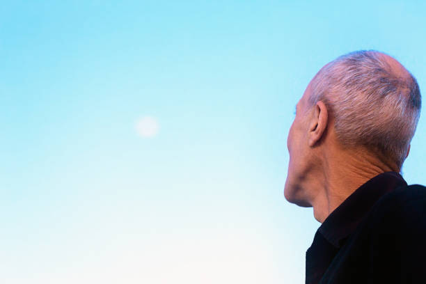 Close up portrait of confident mature businessman in office