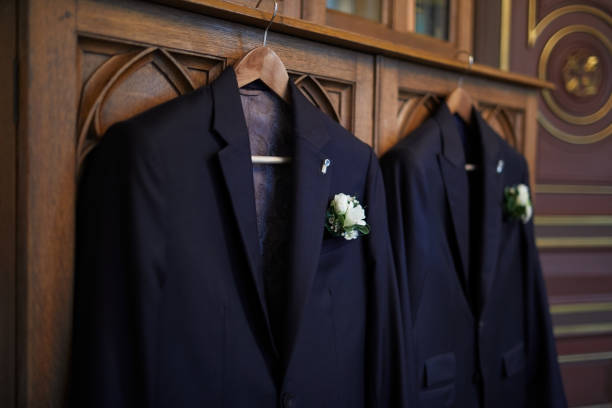 istock Pair of suits hanging ready for the wedding. 1153383619