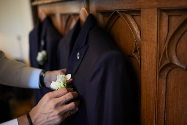 istock Pair of suits hanging ready for the wedding. 1153383623