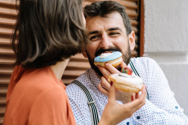 istock Happy young couple having fun outdoors 1153385565