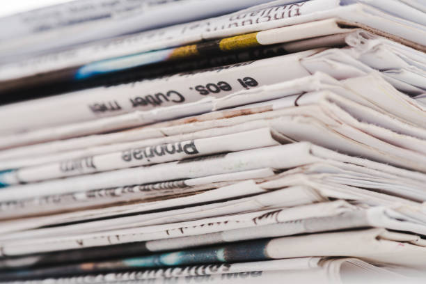 istock close up of different print daily newspapers in stack 1153386001