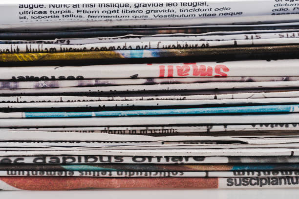 istock background with different print daily newspapers in pile 1153386048