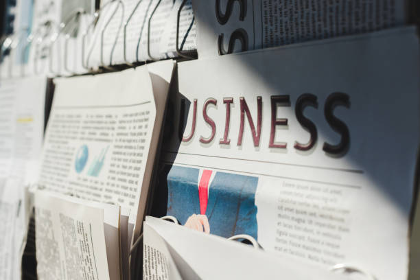 istock selective focus of different print newspapers on stand in sunlight 1153386355