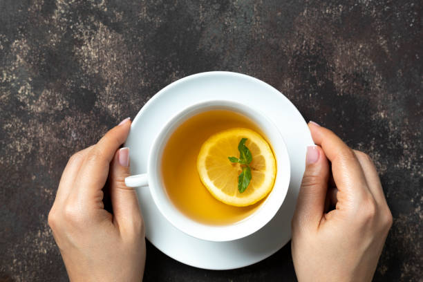 istock Woman with Herbal Tea 1153386511