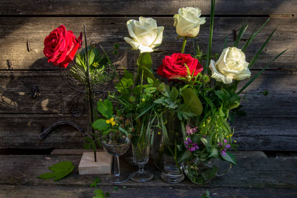 istock flowers from the garden in vases 1153387330