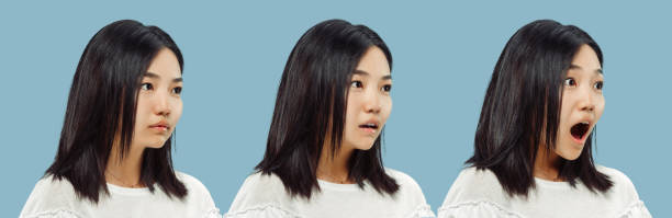 istock Korean young woman's half-length portrait on blue background 1153388739