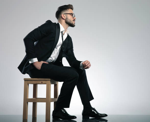 istock Concerned young man sitting and looking to the side 1153397995