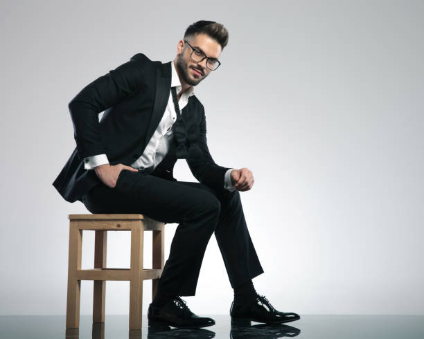 istock Confident man sitting and looking to the camera 1153398394