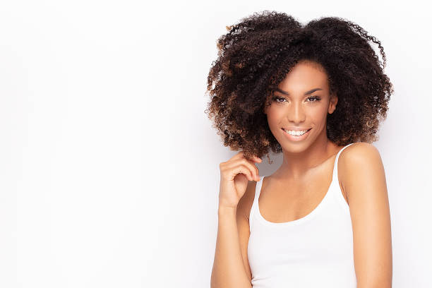 istock Young afro girl posing in studio. 1153406065