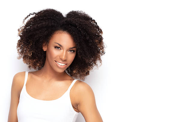 istock Young afro girl posing in studio. 1153406115