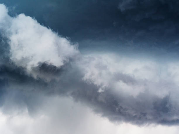 istock dark cumulus clouds diagonally before a thunderstorm 1153407878