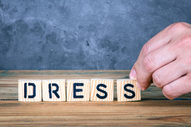 istock Dress - word from wooden letters 1153410067