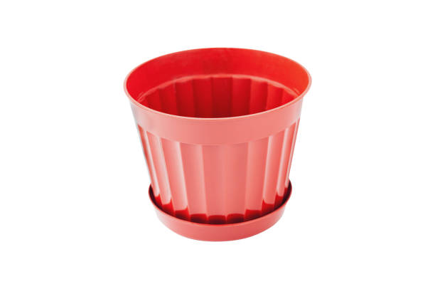 istock One new empty clean brown plastic pot for flower with coaster isolated on white background 1153410081