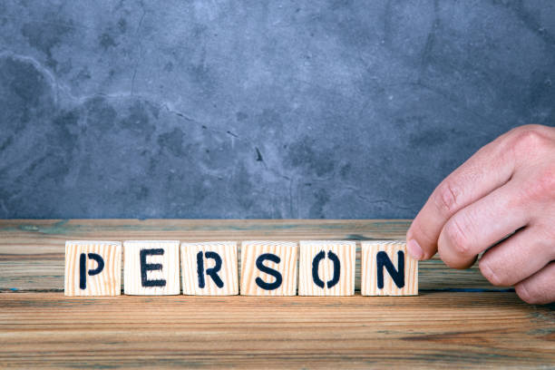 istock Person - word from wooden letters 1153410892
