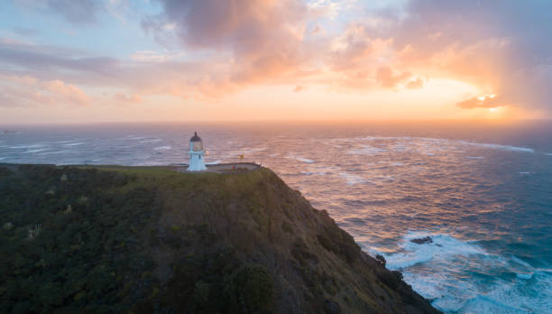 istock Aerial view of Cape Reinga Lighthouse during sunset. 1153411367