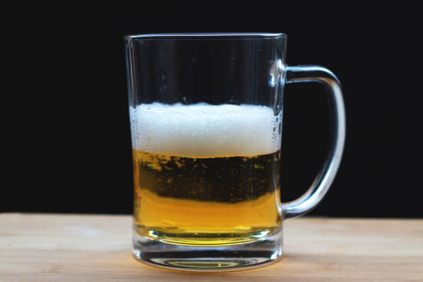 Beer in a transparent glass with bubbles